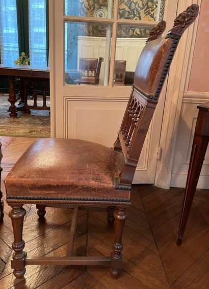 Pair of chairs in molded wood, the openwork...