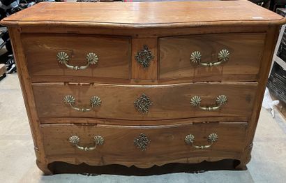 Walnut chest of drawers with curved front...