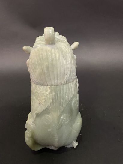 Carved light green jadeite Dog of Fô.
20th...