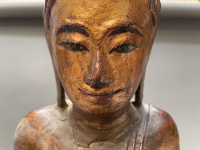 Seated Buddha in carved and gilded wood,...