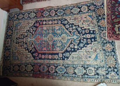 Woolen prayer rug with mihrab decoration...