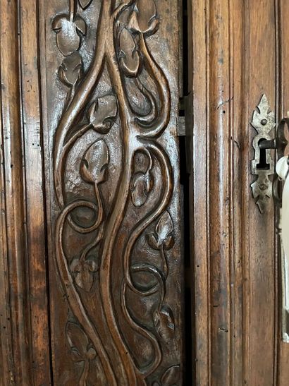 Carved walnut sideboard with four doors and...