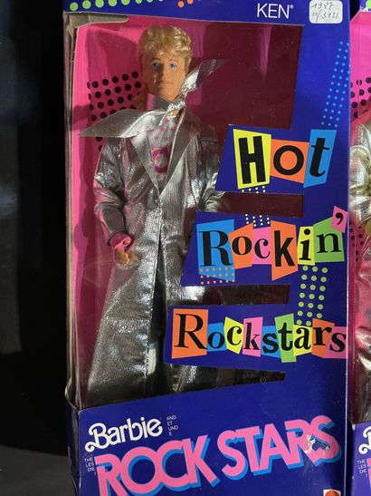 Five Mattel Barbie dolls: two rock stars...