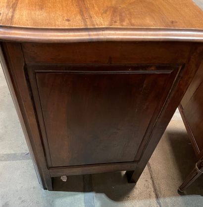 Walnut chest of drawers opening to four drawers...