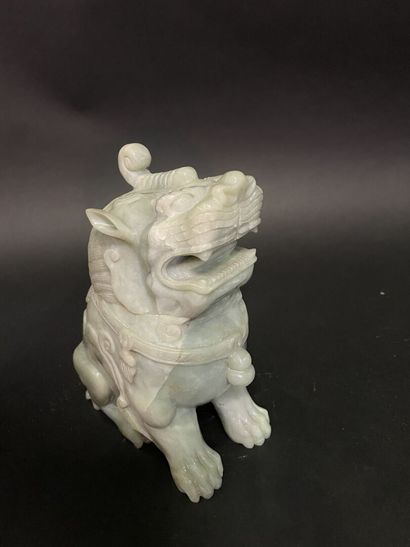 Carved light green jadeite Dog of Fô.
20th...
