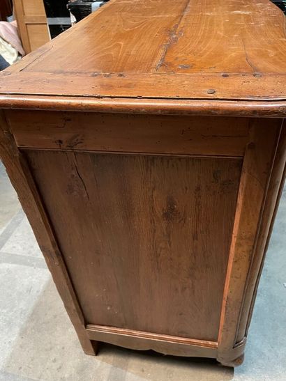 Walnut chest of drawers with curved front...