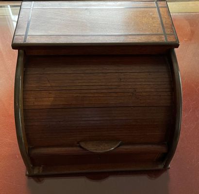 Wooden mail box closed by a cylinder with...