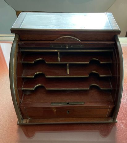 Wooden mail box closed by a cylinder with...