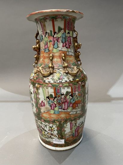 A Canton porcelain baluster vase decorated...