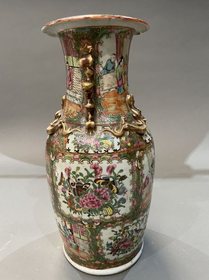 A Canton porcelain baluster vase decorated...