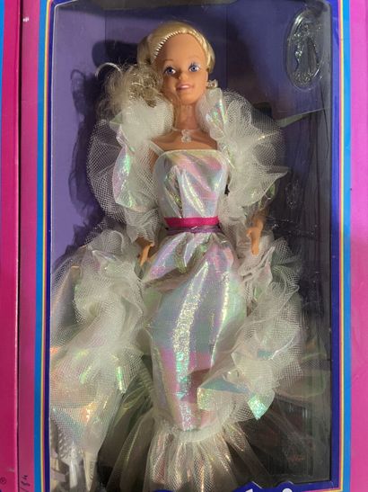 Two Mattel Barbie dolls, Ken and Barbie Crystal...