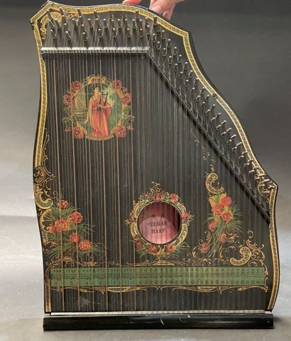 Painted wood lyre harp of English make
In...