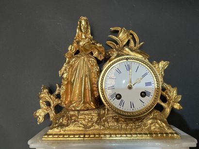 Clock in gilt metal and alabaster with a...