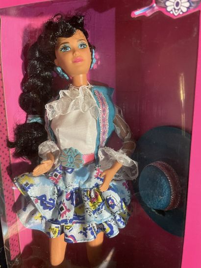 Lot including three Mattel Barbie dolls (a...