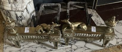 Pair of ormolu andirons decorated with recumbent...