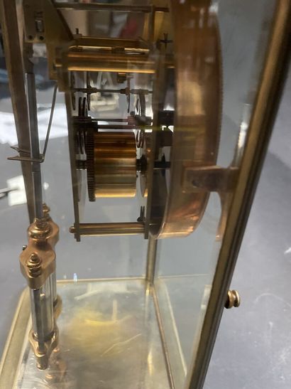 Cage clock in gilded brass and glass walls
19th...