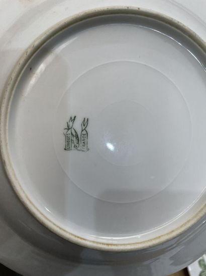 Part of a porcelain dinner service with gilded...