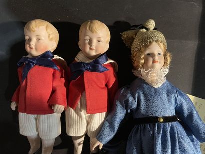 Lot of five dolls: one porcelain doll, original...
