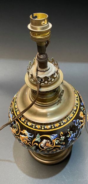 Two ceramic lamp bases, one with grotesque...