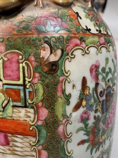 A Canton porcelain baluster vase decorated...