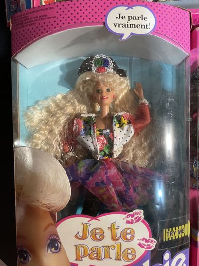 Lot including three Mattel Barbie dolls (a...