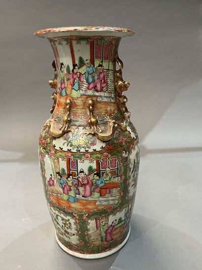 A Canton porcelain baluster vase decorated...