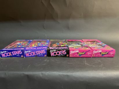 Five Mattel Barbie dolls: two rock stars...