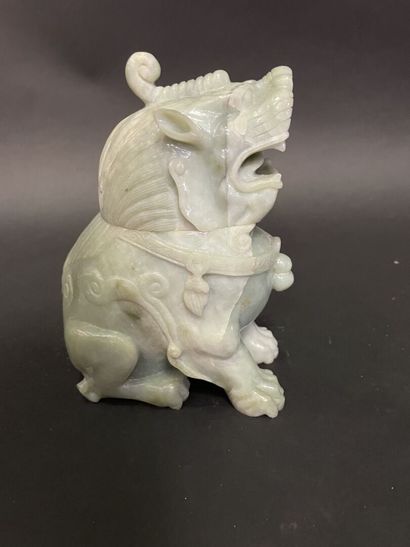 Carved light green jadeite Dog of Fô.
20th...