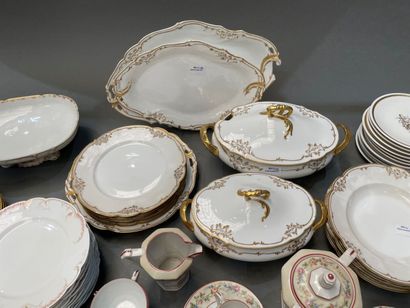 Part of a porcelain dinner service with gilded...