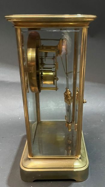 Cage clock in gilded brass and glass walls
19th...