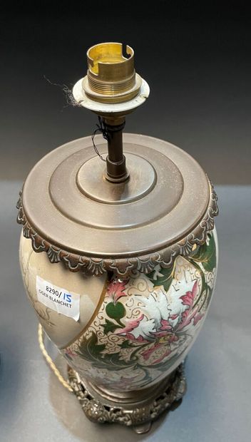Two ceramic lamp bases, one with grotesque...