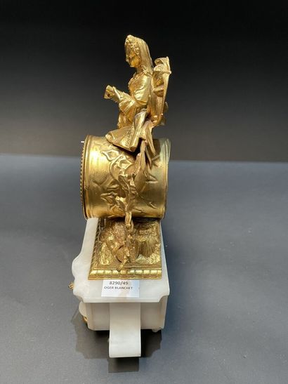 Clock in gilt metal and alabaster with a...