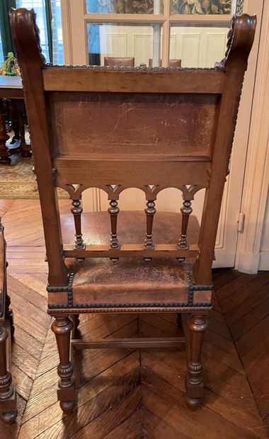 Pair of chairs in molded wood, the openwork...