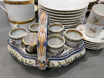 Part of a porcelain dinner service with gilded...