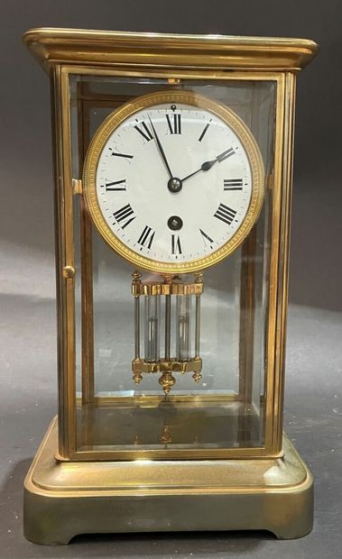 Cage clock in gilded brass and glass walls
19th...