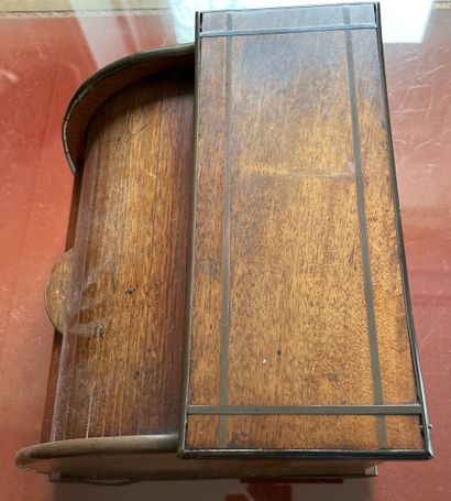 Wooden mail box closed by a cylinder with...
