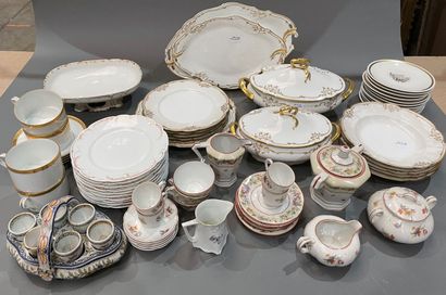Part of a porcelain dinner service with gilded...