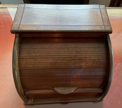 Wooden mail box closed by a cylinder with...