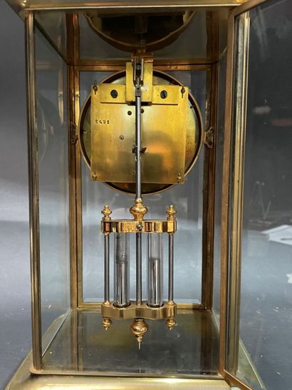 Cage clock in gilded brass and glass walls
19th...