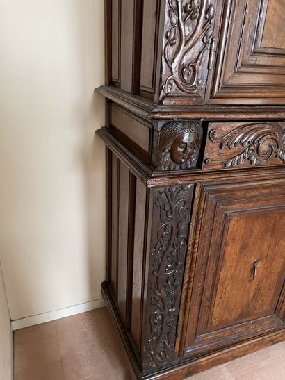 Carved walnut sideboard with four doors and...