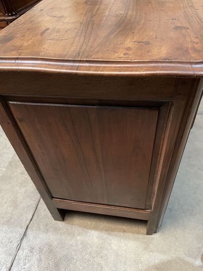 Walnut chest of drawers opening to four drawers...