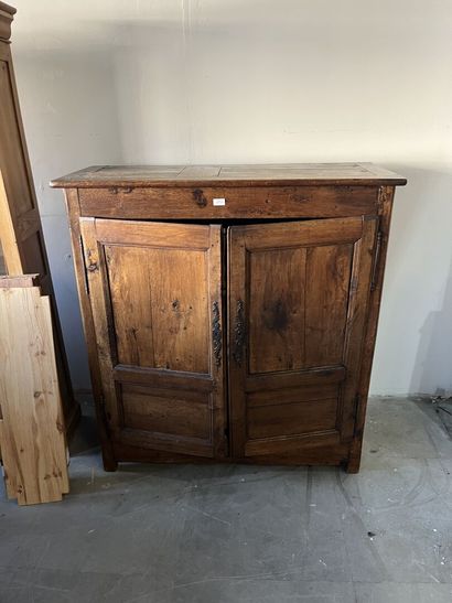 Two doors sideboard in fruitwood. 
Period...