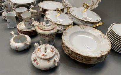 Part of a porcelain dinner service with gilded...