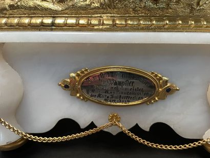 Clock in gilt metal and alabaster with a...