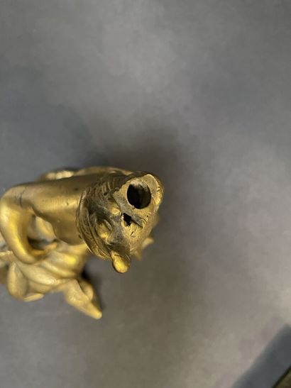 Bronze group representing a goddess sitting...