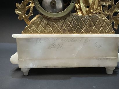 Clock in gilt metal and alabaster with a...