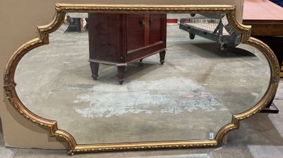 Oblong mirror in wood and gilded stucco decorated...