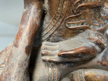 Seated Buddha in carved and gilded wood,...
