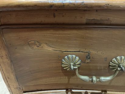 Walnut chest of drawers with curved front...