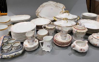 Part of a porcelain dinner service with gilded...